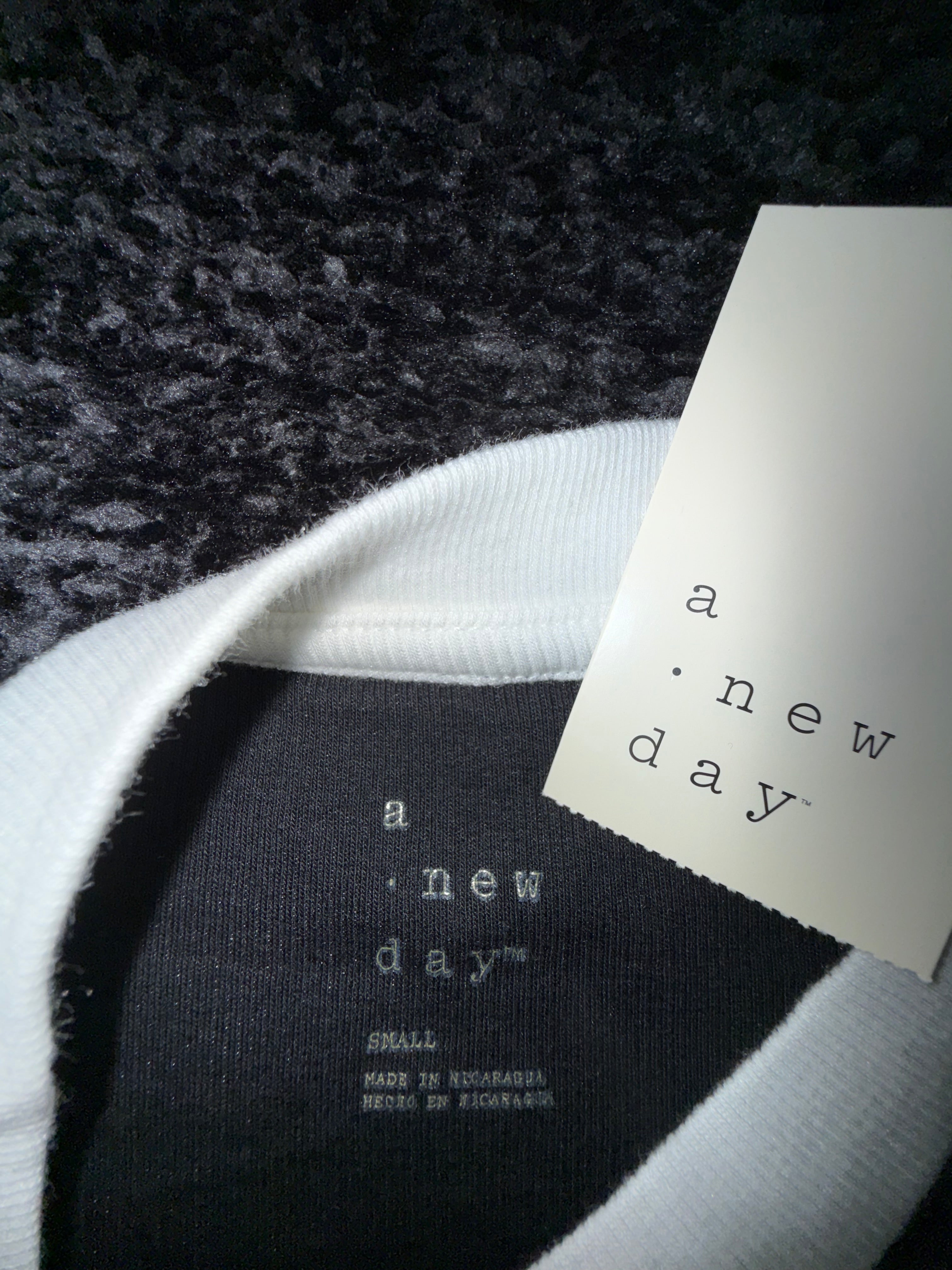 A New Day Black Shirt with White Neck Detail